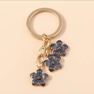 NWT Cherry Blossom keychain / bagcharm, black